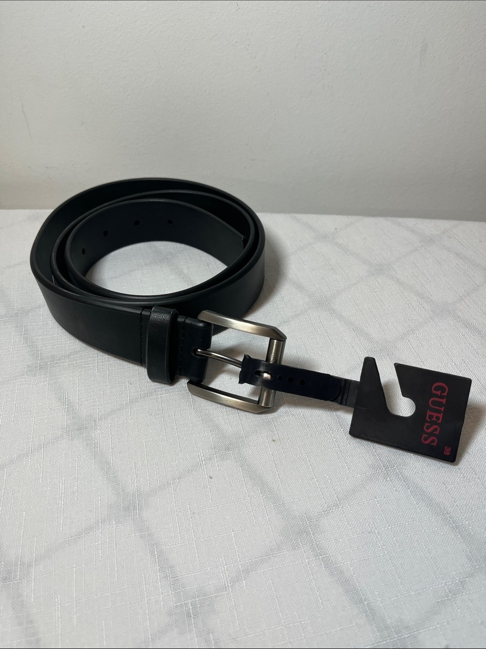 GUESS Black Leather Belt with Silver Buckle
New
Size 38